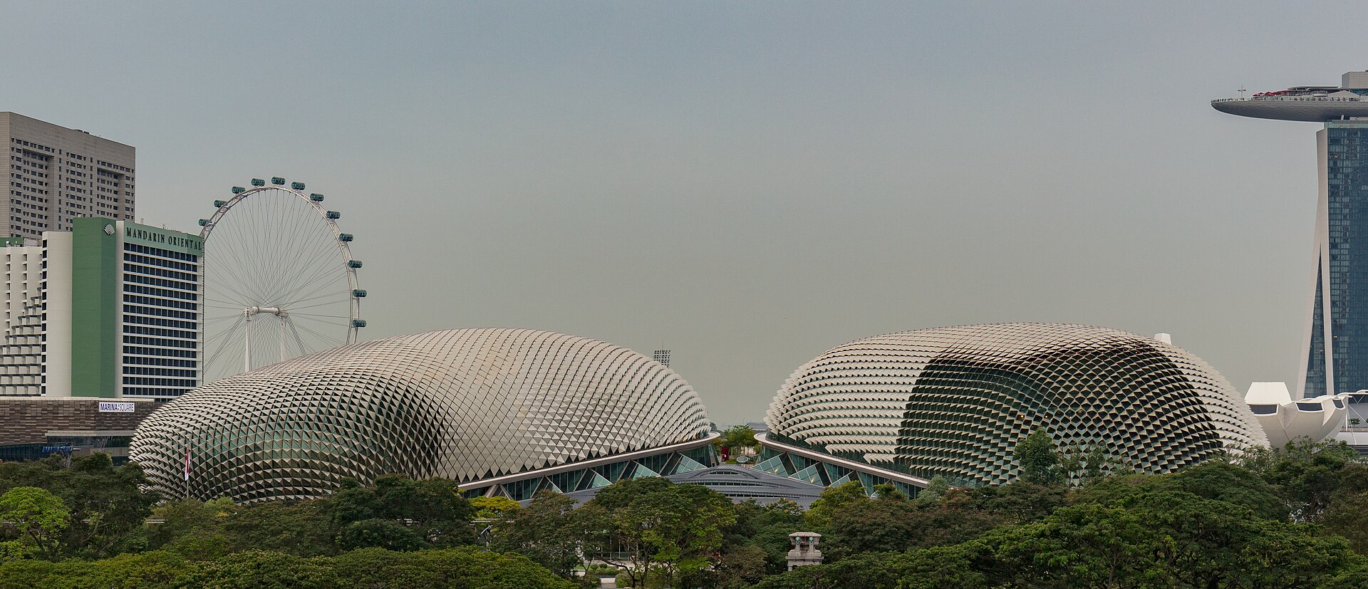 The twin domes of Esplanade, Theatres on the Bay, on the Marina Bay waterfront, with the Singapore Flyer and Marina Bay Sands behind